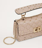 Valentino Garavani Small Rockstud Spike top-handle bag quilted lambskin (British brand)