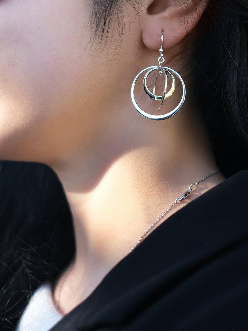 Andea sterling silver spinning hoop drop earrings (British brand)