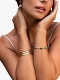 Dower & Hall hammered bangle yellow gold, imported from the UK