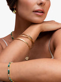 Dower & Hall hammered bangle yellow gold, imported from the UK