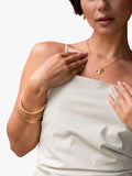 Dower & Hall hammered bangle yellow gold, imported from the UK