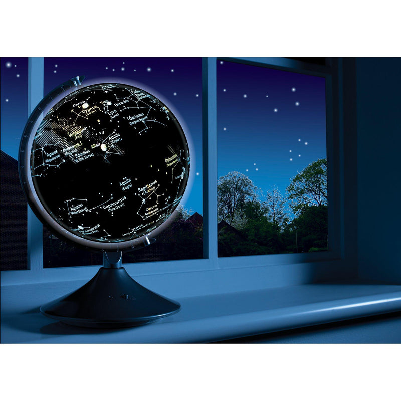 Illuminated Earth and constellations globe showing world map and stars - British product
