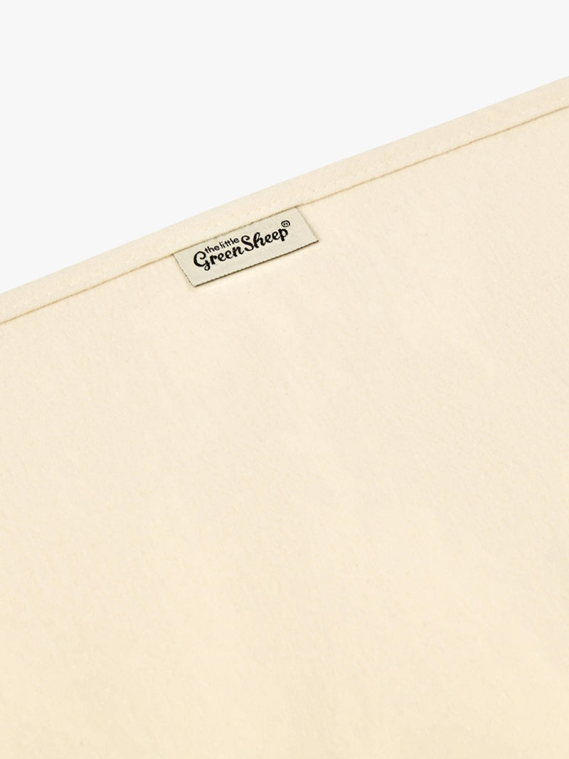 The Little Green Sheep waterproof cotbed mattress protector (British brand)