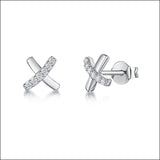 Jools cross stud earrings in silver (British brand)