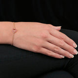 London Road rose gold ruby circle charm bracelet, UK version