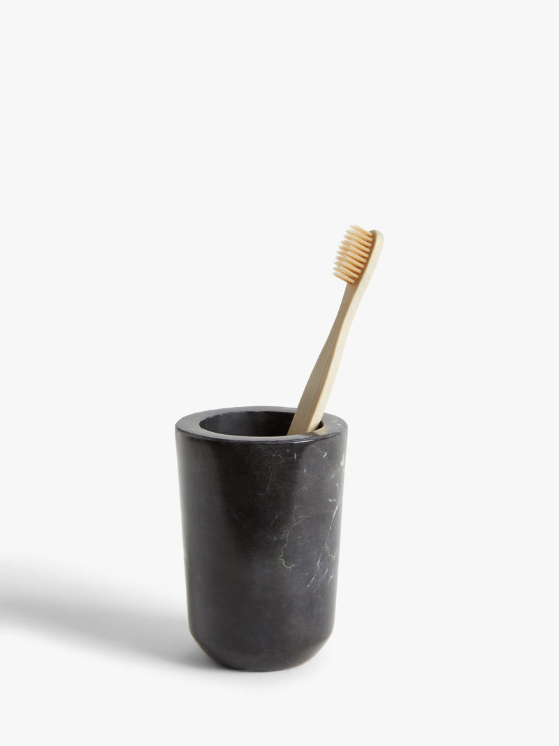 Black marble bathroom tumbler with fine grain and white veins, UK version