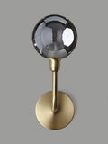 John Lewis Huxley wall light in antique brass with smoked glass shade, UK version