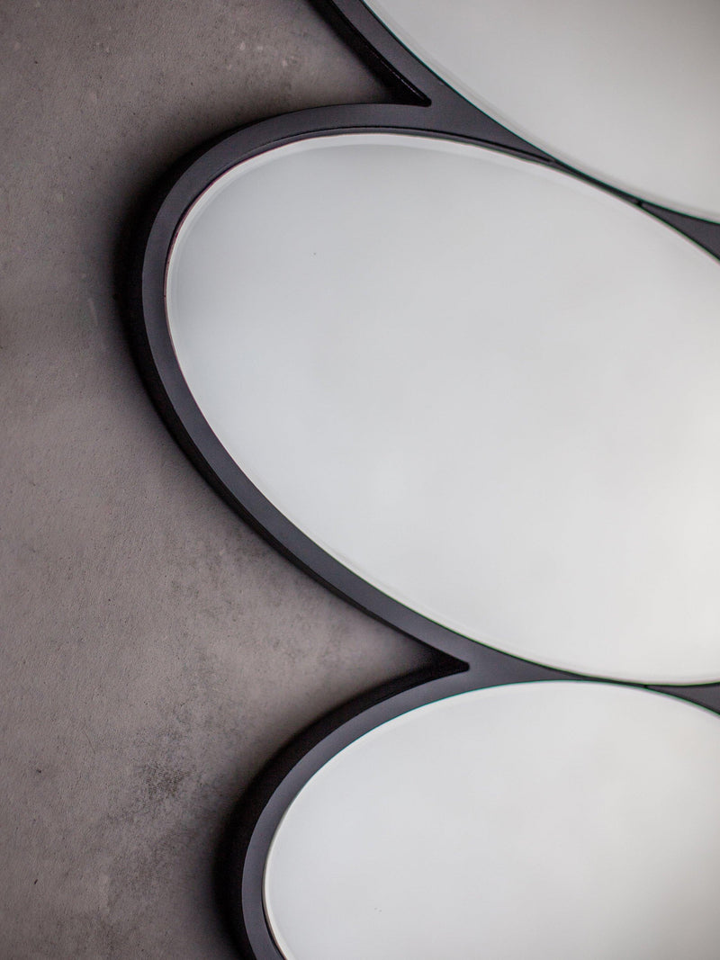 Gallery Direct Pebble Stack abstract wall mirror 118x54cm black (British brand)