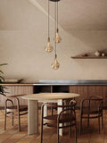 Tala brass triple pendant light with Voronoi II bulbs - British product