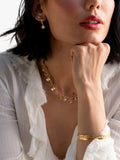 Dower & Hall gold vermeil hammered hoop earrings, imported from the UK