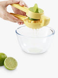 Joseph Joseph citrus press in bright yellow for juicing lemons and limes, UK version