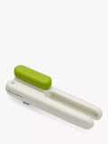 Joseph Joseph multi-function can opener with bottle opener and ring-pull lifter in white and lime green, UK version