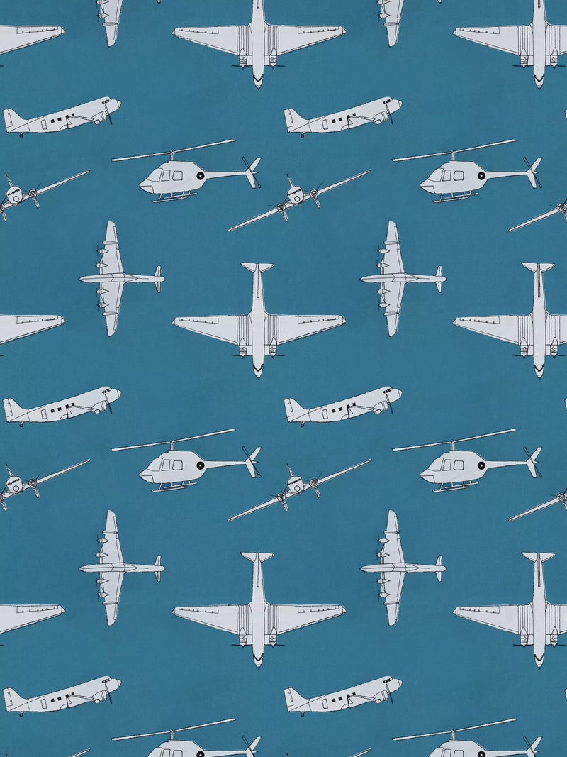 Harlequin Chocks Away fabric with aircraft pattern, imported from the UK