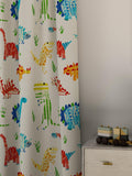 Harlequin Jolly Jurassic furnishing fabric dinosaur print, UK version
