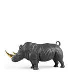 Lladró porcelain rhino figurine with gold accents, 22cm high, UK version