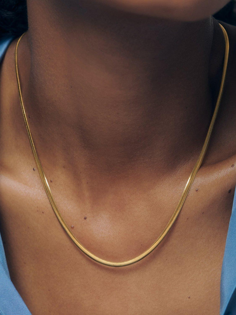 Monica Vinader gold snake chain necklace, imported from the UK
