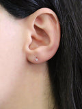 E.W Adams 9ct gold diamond stud earrings 0.10ct, UK version