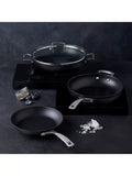 Le Creuset shallow casserole with toughened non-stick coating and glass lid, 24cm, UK version