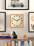 Jones Clocks wall clock orange 25cm, UK version