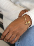 IBB 18ct gold crossover knot bangle (British brand)
