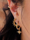 LARNAUTI north star charm hoop earrings gold, imported from the UK