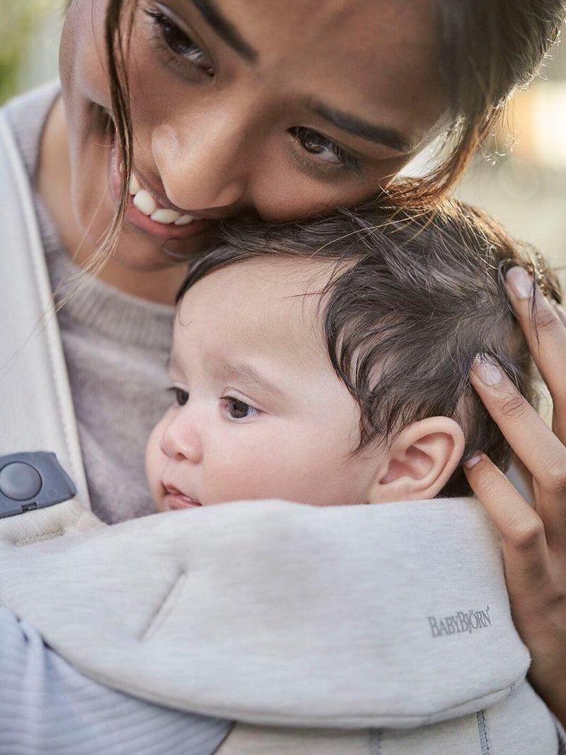BabyBjörn baby mini carrier in light beige for newborns to 1 year - British product
