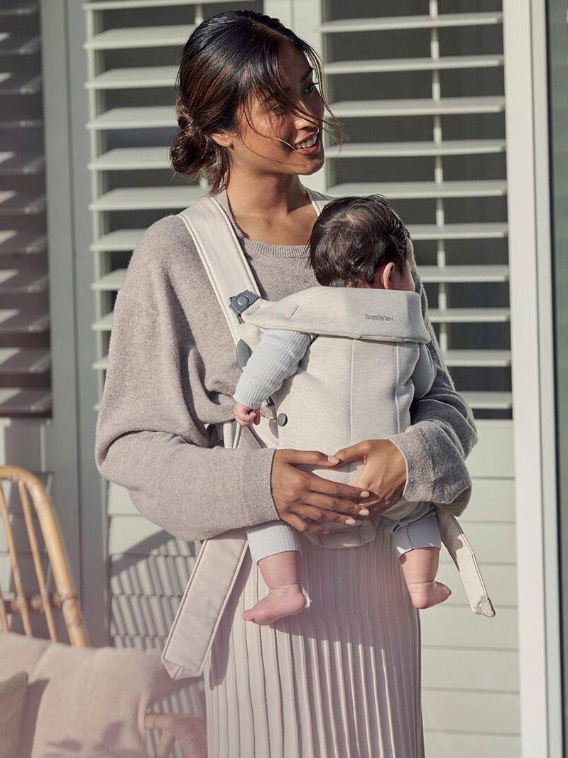 BabyBjörn baby mini carrier in light beige for newborns to 1 year - British product