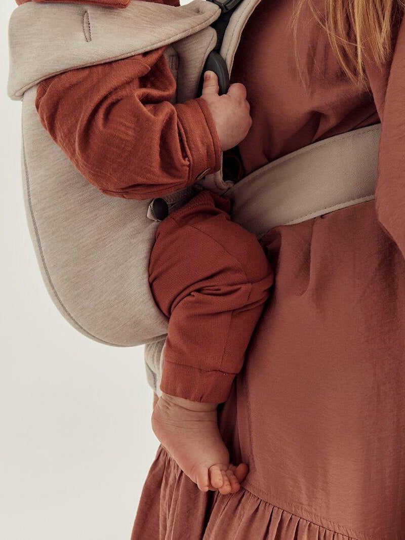 BabyBjörn baby mini carrier in light beige for newborns to 1 year - British product
