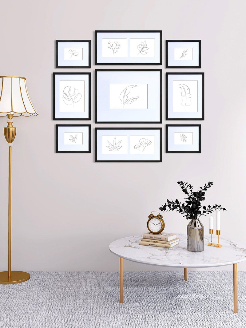 Nielsen multi-aperture photo frame set for 11 photos in black, imported from the UK
