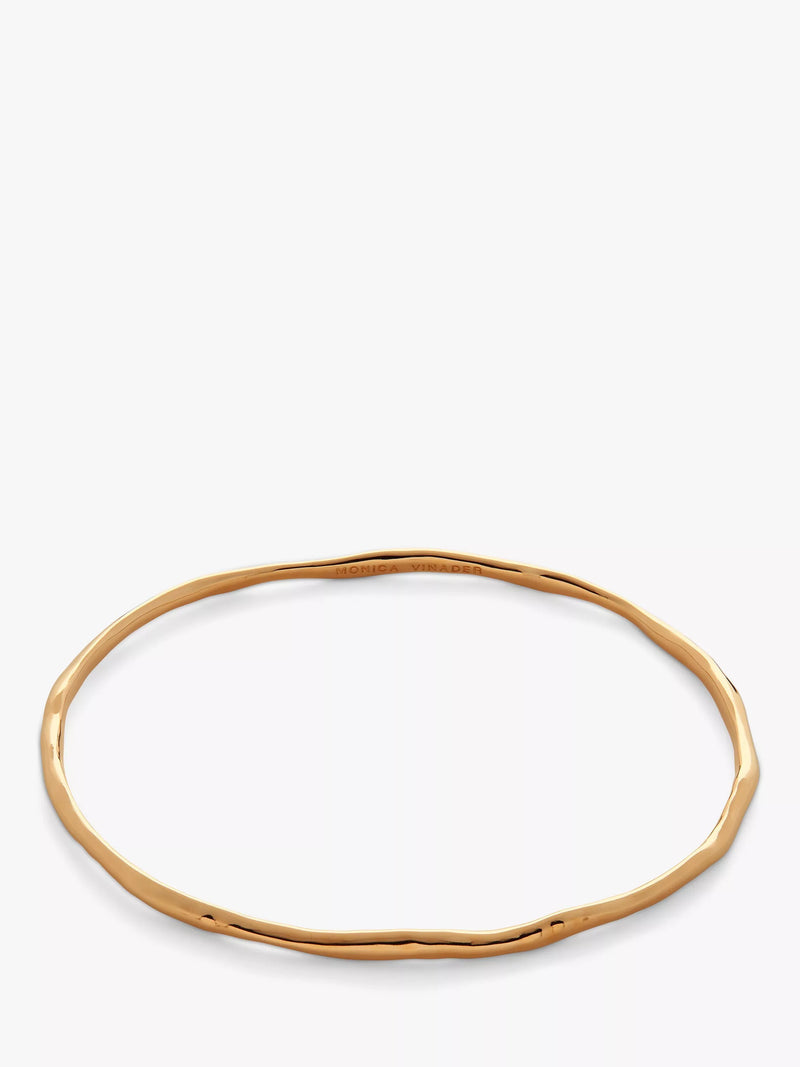 Monica Vinader gold bangle with hammered surface - British product