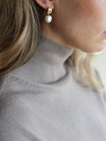 Tutti drop pearl huggie earrings in gold plated brass, UK version