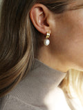 Tutti drop pearl huggie earrings in gold plated brass, UK version