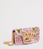 Valentino Garavani small Locò shoulder bag with sequins, imported from the UK