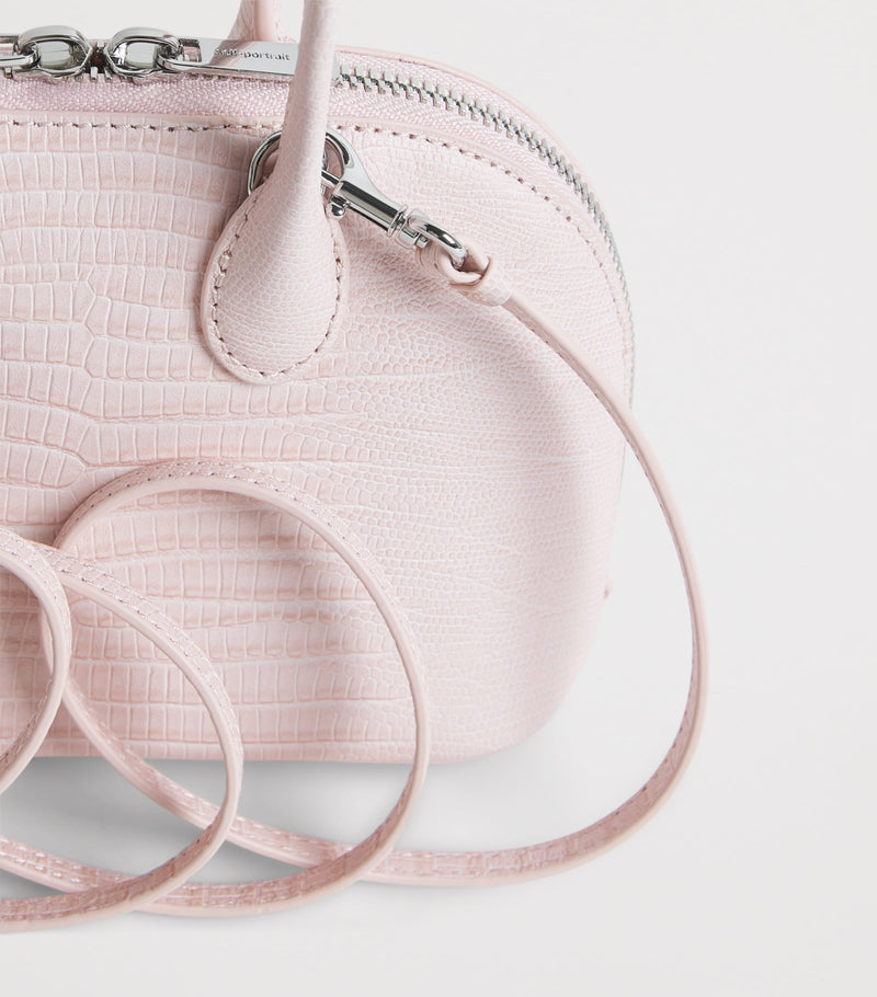 Self-Portrait mini leather top-handle bag, imported from the UK