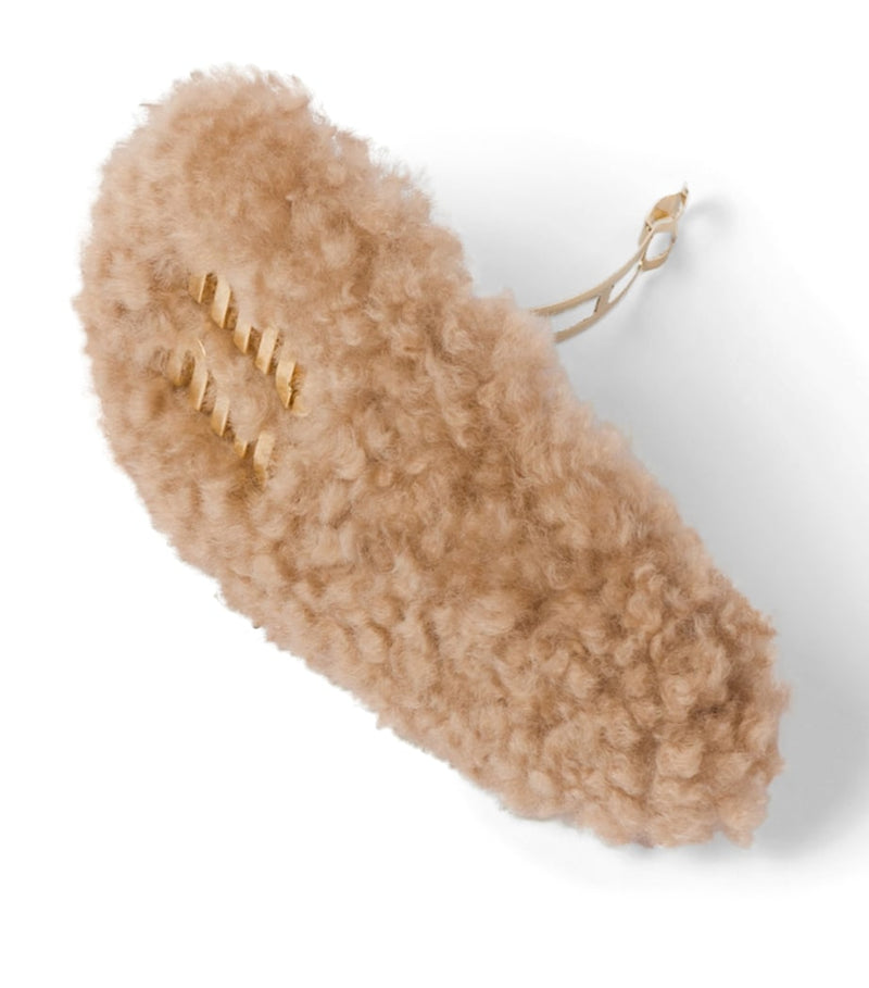 Miu Miu shearling logo hair clip with gold-tone hardware, imported from the UK