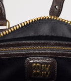 Miu Miu Arcadie top-handle bag matelassé leather, imported from the UK