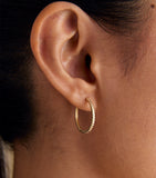 Astrid & Miyu yellow gold ridged hoop earrings (British brand)