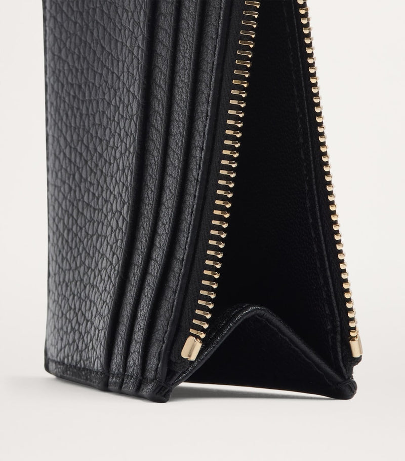 Valentino Garavani leather coin and card holder with Rockstud trim (British brand)