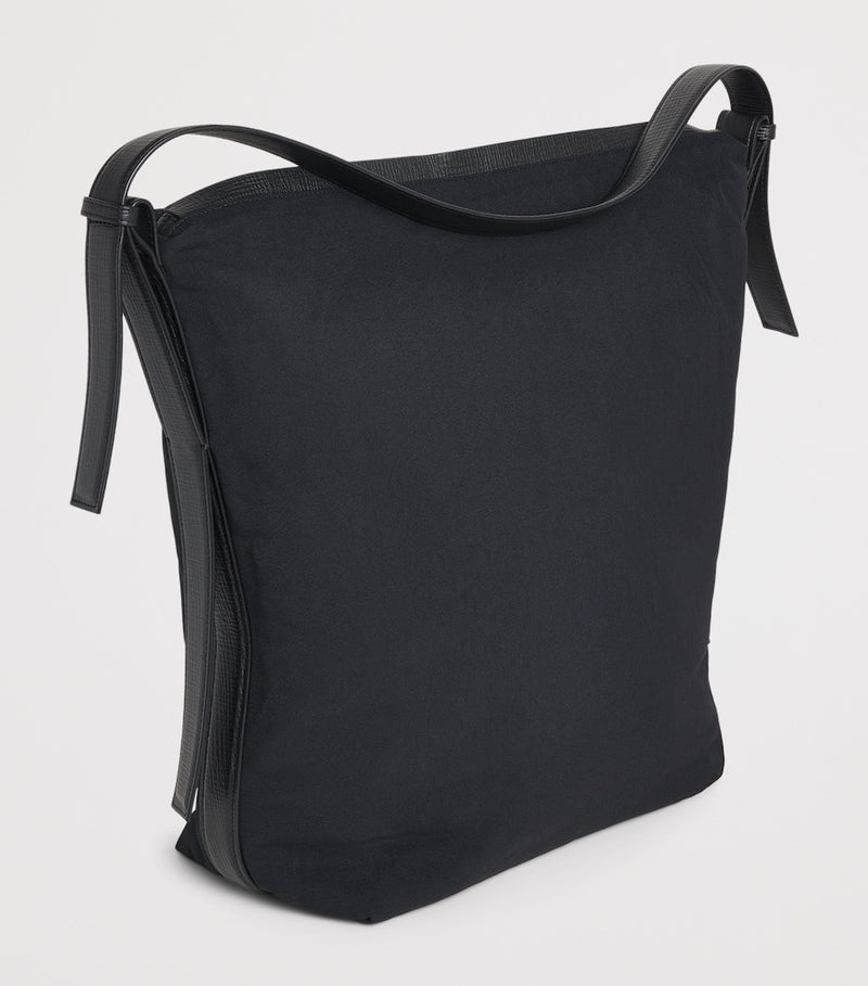Studio Nicholson large nylon Airport shoulder bag, imported from the UK