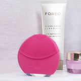 Foreo Luna Mini 2 facial cleanser in Fuchsia, imported from the UK