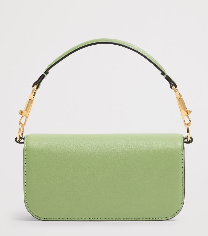 Valentino Garavani Locò small leather shoulder bag, imported from the UK