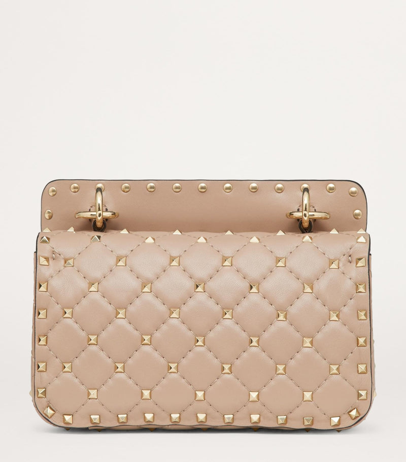 Valentino Garavani Small Rockstud Spike top-handle bag quilted lambskin (British brand)