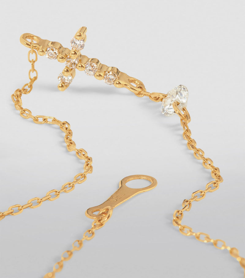 Persée gold cross bracelet with diamonds (British brand)