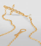 Persée gold cross bracelet with diamonds (British brand)