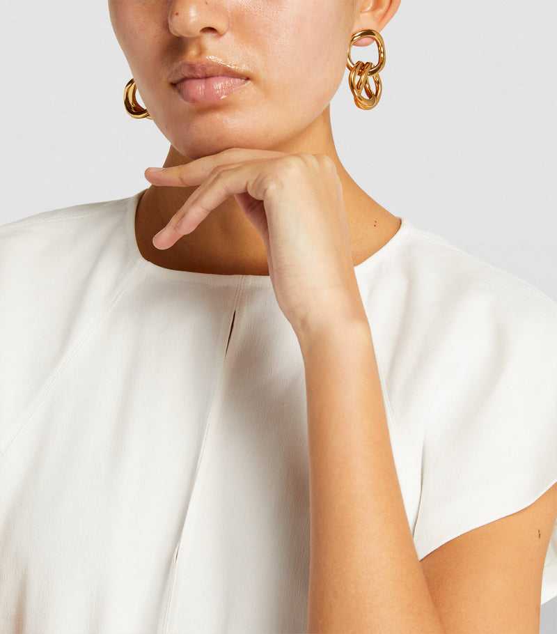 Isabel Marant multi-hoop earrings in polished brass, imported from the UK