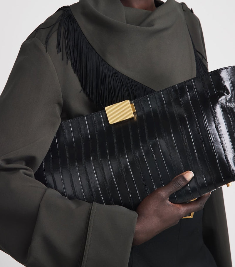Camilla and Marc embossed leather poppy clutch bag (British brand)