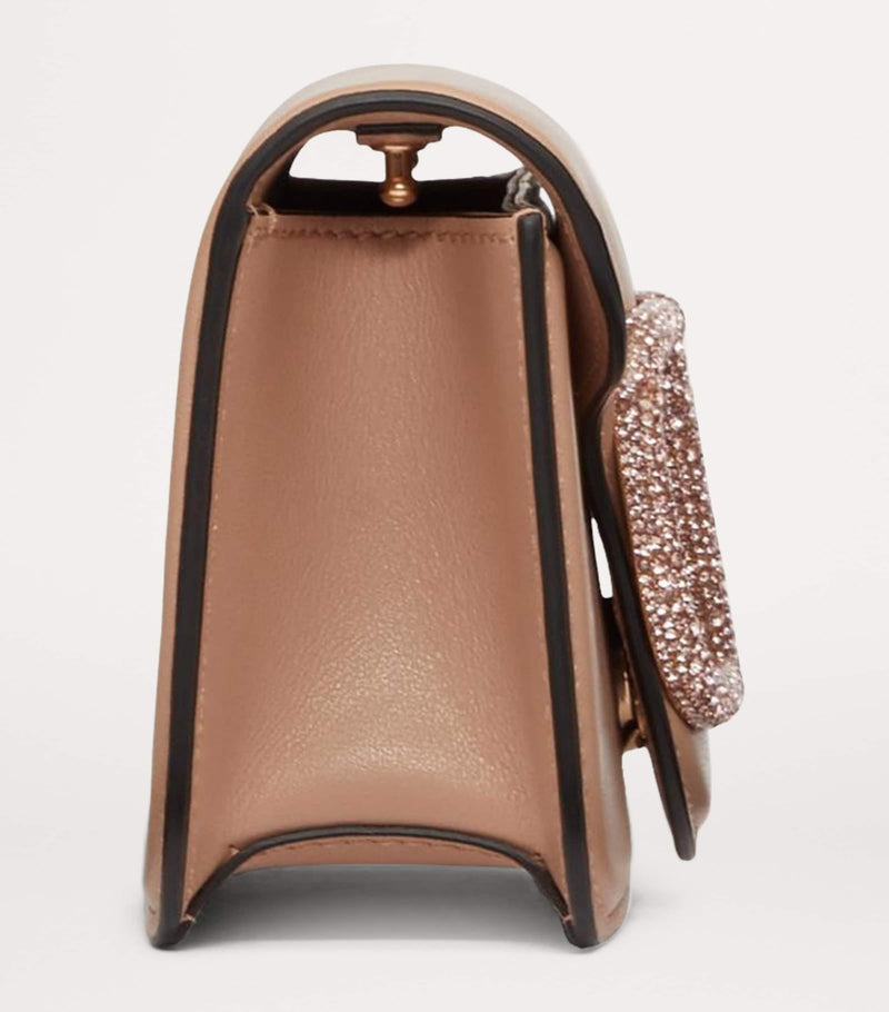 Valentino Garavani Small Leather Locò shoulder bag, imported from the UK