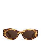 Harrods Alaïa Acetate Speckled Oval Sunglasses- Buy online at McGrocer