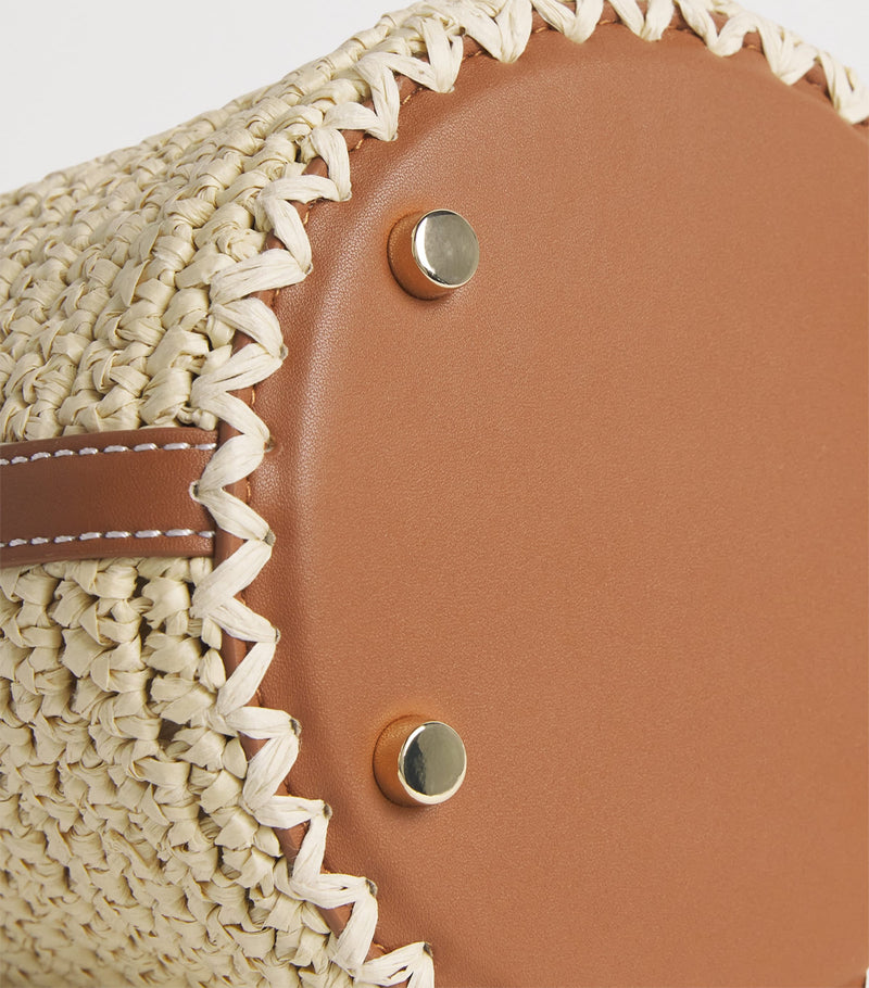 Self-Portrait mini raffia bucket bag, imported from the UK