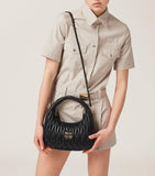 Miu Miu matelassé leather Wander top-handle bag (British brand)